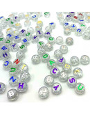 Letra varios colores. Moneda transparente. 10 mm diámetro. 2,5 mm perforación. 50 uds aproximado.