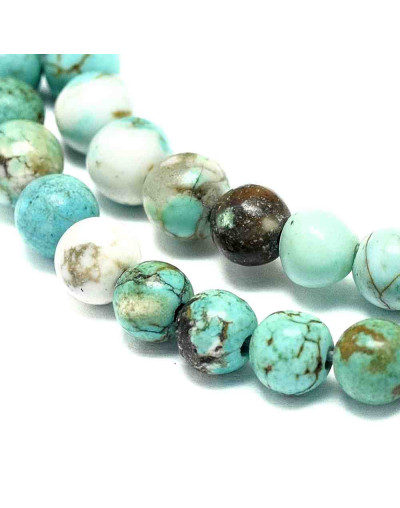 Turquesa natural. 10 mm diámetro. 1 mm perforación. 35 unidades hilo (aproximado)