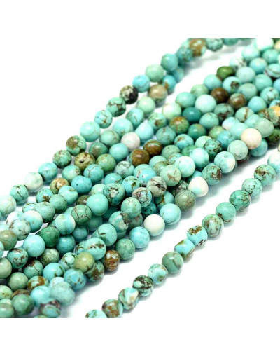 Turquesa natural. 10 mm diámetro. 1 mm perforación. 35 unidades hilo (aproximado)