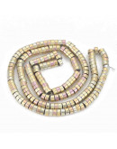 Hematite sintético. Heishi beads. Dorado mult. 4x2 milímetros. 1 mm perforación. 200 uds hilo aprox. Hematite sintético. Heishi beads. Dorado mult. 4x2 milímetros. 1 mm perforación. 200 uds hilo aprox.