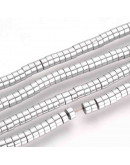 Hematite sintético. Heishi beads. Plateado. 4x2 milímetros. 1 mm perforación. 200 uds hilo aprox. Hematite sintético. Heishi beads. Plateado. 4x2 milímetros. 1 mm perforación. 200 uds hilo aprox.