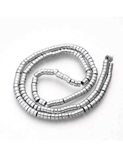 Hematite sintético. Heishi beads. Plateado. 4x2 milímetros. 1 mm perforación. 200 uds hilo aprox.