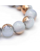 Esfera. Imitación jade con electroplateado en cobre. 04 mm. 1 mm perforación. 200 uds hilo (aprox).