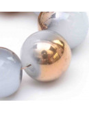 Esfera. Imitación jade con electroplateado en cobre. 04 mm. 1 mm perforación. 200 uds hilo (aprox).