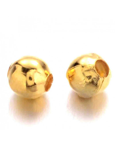 Esfera. Aleación de cobre. Color dorado. 3 mm diámetro. 1,2 mm perforación. 100 unidades aprox.