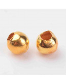 Esfera. Aleación de cobre. Color dorado. 5 mm diámetro. 2 mm perforación. 100 unidades aprox.