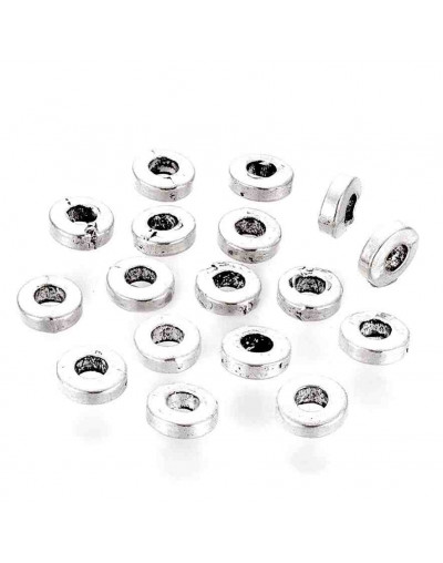 Donut. Aleación. Color plateado. 6x2 milímetros. 2,5 mm perforación. 20 unidades