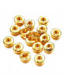 Donut. Aleación. Color dorado. 6x2 milímetros. 2,5 mm perforación. 20 unidades