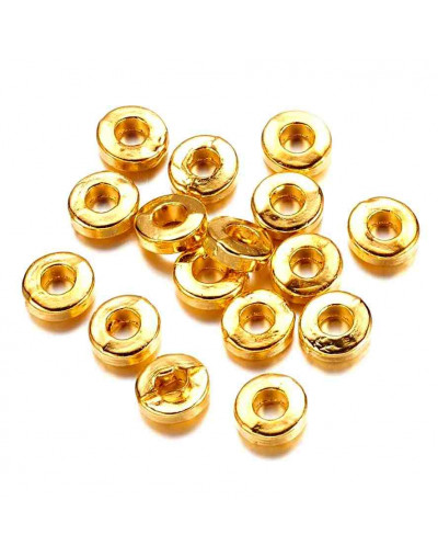 Donut. Aleación. Color dorado. 6x2 milímetros. 2,5 mm perforación. 20 unidades