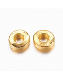 Donut. Aleación. Color dorado. 6x2 milímetros. 2,5 mm perforación. 20 unidades