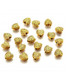 Corazón (7). Aleación de cobre. Color dorado antiguo. 9x9x4 mm. 1.5 mm perforación. 10 uds.