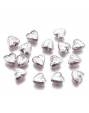 Corazón (5). Aleación de cobre. Color plata antigua. 8x8x4 mm. 1.5 mm perforación. 10 uds.