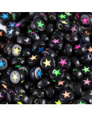 Estrella varios colores. Moneda negra. 7 milímetros lado. 1,5 mm perforación. 100 uds aproximado.