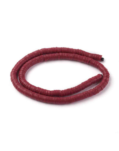 Discos. Color rojo vino. 6 milímetros diámetro. 1 mm grosor. 1 mm perforación. 380~400 uds hilo.