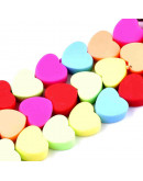 Corazones. Varios colores. 9,5x10x5 milímetros. 1,2 mm perforación. 40 unidades hilo (aproximado).