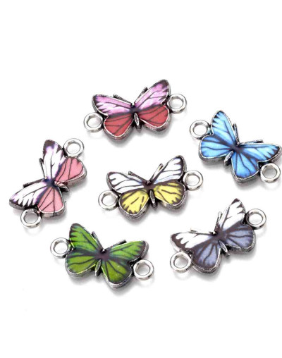 Mariposas. Aleación de cobre y esmalte. 12x23x2 mm. 2,50 mm perforación. 4 unidades