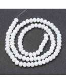 Rondelle faceteado. 4x3 milímetros. Blanco. 1 mm perforación. 130 uds hilo (aproximado).