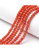 Rondelle faceteado. 4x3 milímetros. Naranja. 1 mm perforación. 130 uds hilo (aproximado).