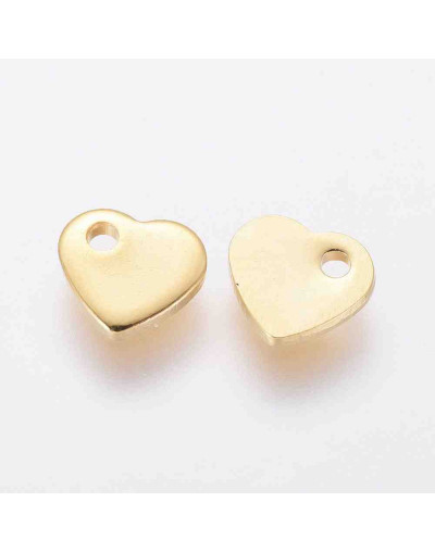 Corazón. Acero inoxidable. Color dorado. 5x6x1 mm. 1 mm perforación. 5 unidades