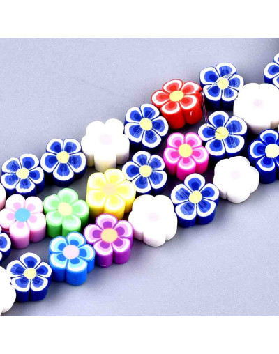 Flores. Varios colores. 10x10x4 milímetros. 1 mm perforación. 39 unidades hilo (aproximado).