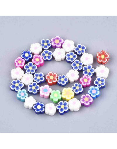 Flores. Varios colores. 10x10x4 milímetros. 1 mm perforación. 39 unidades hilo (aproximado).