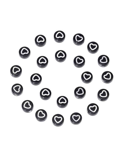 Corazón blanco. Moneda negra. 7 milímetros diámetro. 1,5 mm perforación. 100 uds aproximado.