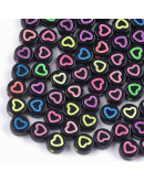 Corazón varios colores. Moneda negra. 7 mm diámetro. 1,5 mm perforación. 100 uds aproximado.