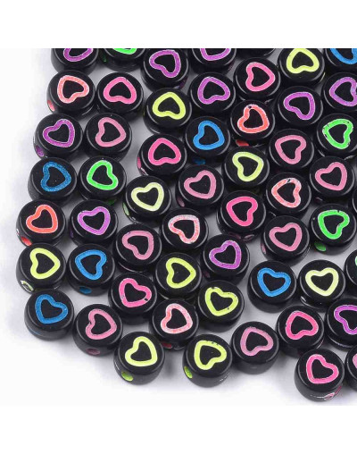 Corazón varios colores. Moneda negra. 7 mm diámetro. 1,5 mm perforación. 100 uds aproximado.