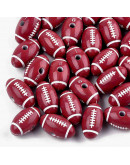 Deportes: Rugby. Color vino. 18x10 milímetros. 3 milímetros perforación. 15 unidades.