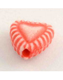 Corazón (1). Varios colores. 7,5x8x4 milímetros. 2 mm perforación. 100 unidades aproximado.