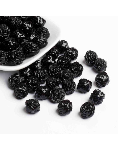Flor (3). Color negro. 13x8 milímetros. 2 mm perforación. 20 unidades.