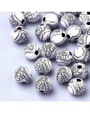 Religión: Virgen María. Esfera blanca. 8 milímetros diámetro. 2 mm perforación. 50 uds aproximado.