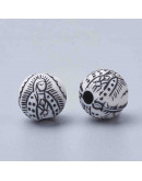 Religión: Virgen María. Esfera blanca. 8 milímetros diámetro. 2 mm perforación. 50 uds aproximado.