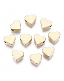 Corazón. Aleación de Cobre. Baño 18K Gold. 6x7x3 mm. 1,2 mm perforacion. 2 unidades Corazón. Aleación de Cobre. Baño 18K Gold. 6x7x3 mm. 1,2 mm perforacion. 2 unidades