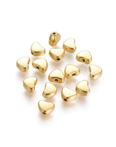 Corazón (2). Aleación de cobre. Color dorado antiguo. 6x5x5 mm. 1 mm perforación. 20 unidades.