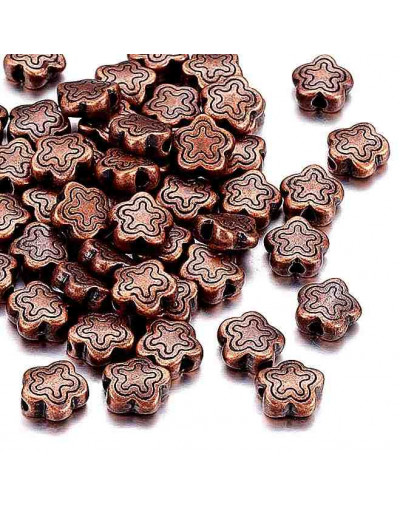 Flores. Cobre. Color cobre antiguo. 7x2,5 mm. 1,5 mm perforación 20 unidades