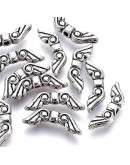 Alas. Aleación de cobre. Color plata antigua. 16x5x3 milímetros. 1,5 mm perforación. 20 unidades.
