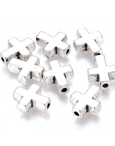 Cruces. Aleación de cobre. Color plata antigua. 15x12x5 mm. 2 mm perforación. 10 unidades