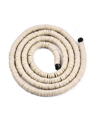 Discos. Color beige. 6 mm diámetro. 1 mm grosor. 1 mm perforación. 380~400 uds hilo.