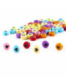 Corazón negro sólido. Moneda varios colores. 7 mm diámetro. 1,5 mm perforación. 100 uds aproximado.