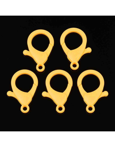 Cierre lobster. Acrílico. Color amarillo. 35x24,5x6 mm. 3 mm agujero. 10 unidades