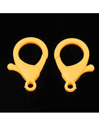 Cierre lobster. Acrílico. Color amarillo. 35x24,5x6 mm. 3 mm agujero. 10 unidades