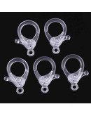 Cierre lobster. Acrílico. Color cristal. 35x24,5x6 mm. 3 mm agujero. 10 unidades