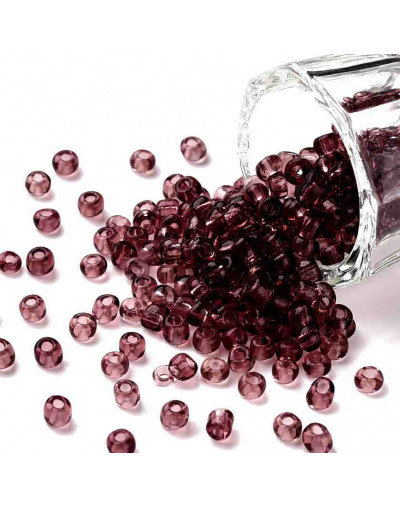 Cristal brillante. PALE VIOLET RED. 4 milímetros. 1,50 mm perforación. 40 gramos. 390 uds. aprox.