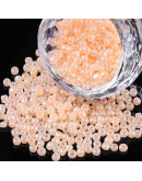 Color Sólido Ceylon. BISQUE. 4 milímetros.1,50 mm perforación. 40 gramos. 390 uds. aprox.