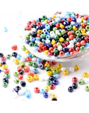 Color Sólido Lustrado. MIXTO. 4 milímetros.1,50 mm perforación. 40 gramos. 390 uds. aprox.