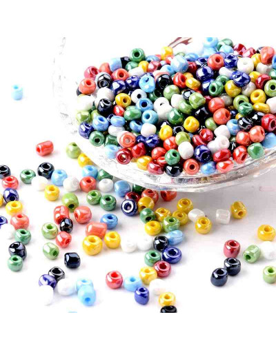 Color Sólido Lustrado. MIXTO. 4 milímetros.1,50 mm perforación. 40 gramos. 390 uds. aprox.