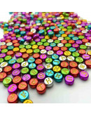 Letra amarilla. Moneda varios colores eléctricos. 7 mm diámetro. 1,5 mm perforación. 100 uds aprox.