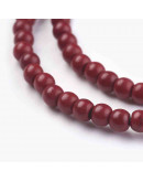 Turquesa sintética. Rojo. 04 mm diámetro. 1 mm perforación. 110 unidades hilo (aproximado)