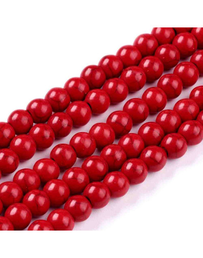 Turquesa sintética. Rojo. 06 mm diámetro. 1 mm perforación. 65 unidades hilo (aproximado)